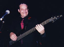 Steve Piticco playing the bass guitar.